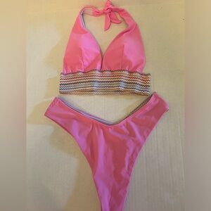 SWIMSUIT UNBRANDED PINK BRAND NEW. NEVER WORN. SIZE MEDIUM.